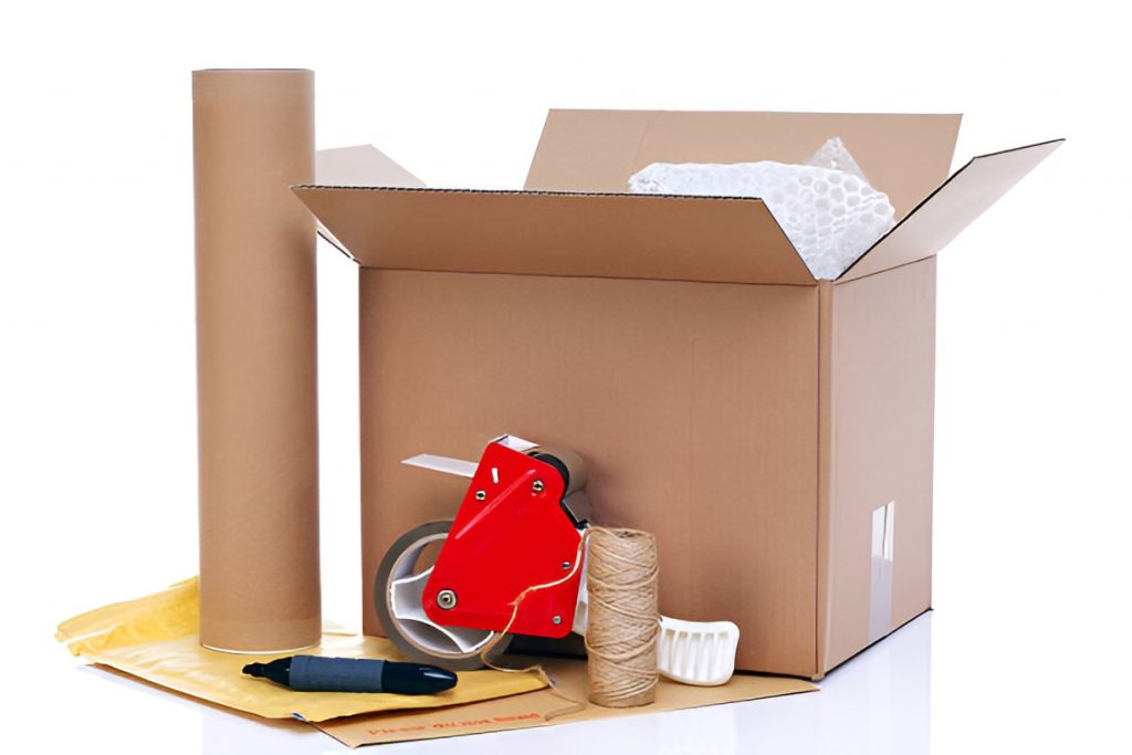 bubble wrap in a moving box, packing tape, and felt pen